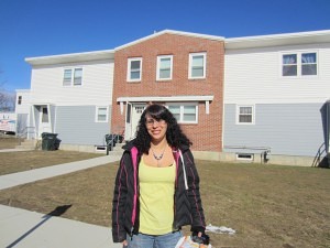 Robinson Gardens resident Sol Muniz says the exterior work at the development has spruced things up and made her happy.