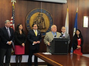 Springfield Schools Superintendent Daniel J. Warwick announces that SHA Executive William H. Abrashkin will conduct an investigation into the death of a student in a school swimming pool. Left to right are Peter Hogan, School Department director of security, Melissa Shea, executive director of human resources, Mayor Domenic J. Sarno, Warwick, Abrashkin, and Lidya Martinez, assistant superintendent.
