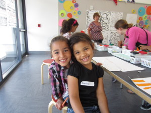 Dorman Elementary School pupils Kyanna Marin and Danielys Martinez-Colon enjoying a day at the Eric Carle Museum in Amherst, as part of the T/R/S! Hasbro Summer Learning Initiative. This photo is the cover of the NAHRO Journal.