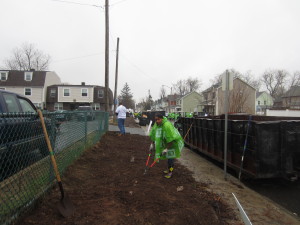 District E Property Manager Sandra West lends a hand at Pendleton Avenue Apartments for Rebuilding Together Springfield.