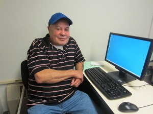 Riverview Apartments resident Santos Torres taught himself to read while attending SHA computer classes.