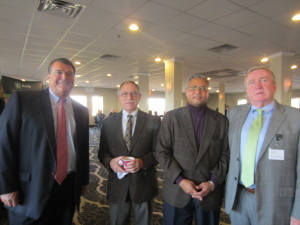 SHA Executive Director William H. Abrashkin, second from left, was keynote speaker at the breakfast. With him are state Representative Jose Tosado and SHA's Sean F. Cahillane.