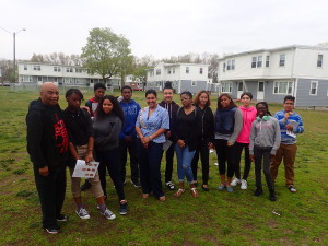 Springfield School Committee member Denise Hurst with members of Springfield Housing Authority's Robinson Gardens Apartments Youth Group.