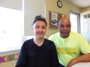Robinson Gardens Youth Group President Christopher Ortiz with Youth Engagement Coordinator Jimmie Mitchell.