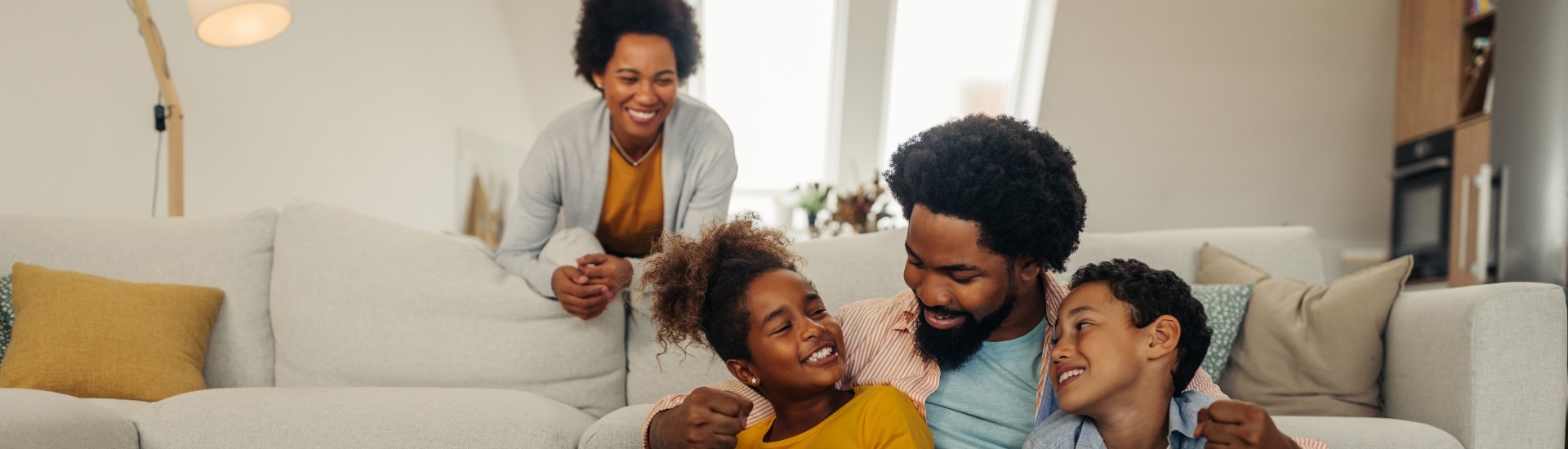 Family Sitting by the couch