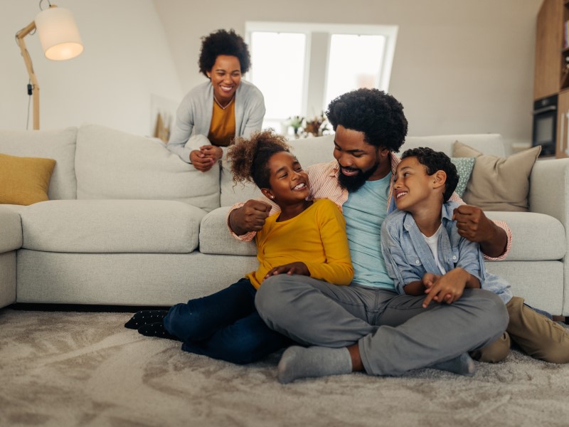 Family Sitting by the couch