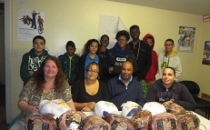 Benefactor gives hams, turkeys to families at Robinson Gardens Apartments