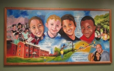 SHA mural captures concept of family literacy