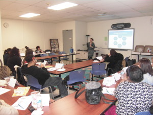 SHA after-school providers at a literacy training workshop at Springfield College.