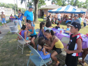 Face painting was a popular activity at the Springfield Housing Authority's Talk/Read/Succeed summer kickoff at Sullivan Apartments.