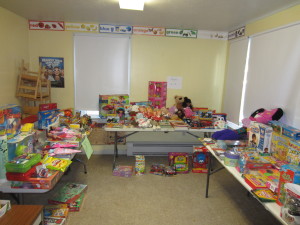 Toys and gifts filled the community room at Robinson Gardents on Christmas Eve.