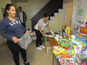 Parents find the right Christmas toys for their children at Robinson Gardens Apartments