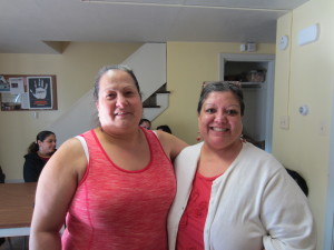 UMass Extension Service nutrition educator Antonia Ramos, left, wtih SHA tenant outreach coordinator Zenaida Burgos.