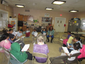 Actors rehearsed their lines together on a recent afternoon at the after-school program at Sullivan Apartments.