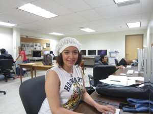 American International College junior Yaribeth Ruiz, a resident at Springfield Housing Authority's Reed Village Apartments, works in a computer classroomon campus.