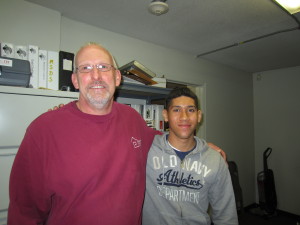 Springfield Housing Authority plumber Richard Hawley and his apprentice, Edgardo Morales.