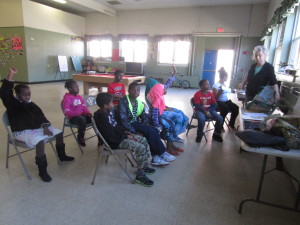 Karen Guillette leads a nature discussion before the walk at Springfield Housing Authority's Riverview Apartments.
