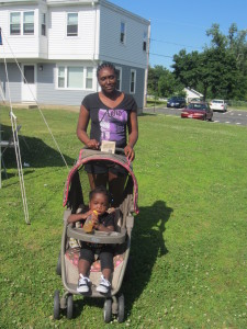 Shanna Scott and baby Genesis Epps at the Spring Fling at Springfield Housing Authority's Robinson Gardens Apartments.