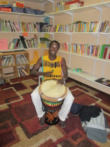 Senegal performing artist Adbou Sarr, who has been playing drums, singing and dancing all his life, at Springfield Housing Authority's Sullivan Apartments.