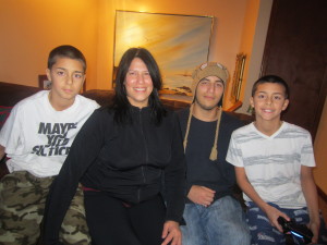 Section 8 homeowner Elizabeth Rodriguez with her sons, left to right, Nexon Rios, Mac Millan and Nelson Rios. She bought her Springfield home though a federal homeownership program administered locally by the Springfield Housing Authority.