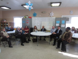 T/R/S! participants and state Rep. Angelo Puppolo discuss program and funding issues.