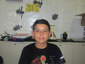 Ten-year-old Mikey Santiago loves the summer camp at Sullivan Apartments.