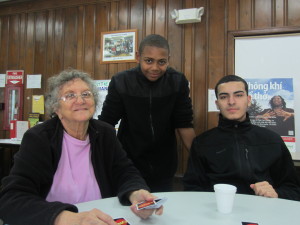 Forest Park Manor resident Phyllis Montgomery with middle school eighth graders Gabriel Camacho and Nelson Dejesus.