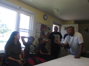 Recovering drug addict John Pearson makes a point at Springfield Housing Authority's Robinson Gardens Youth Group.
