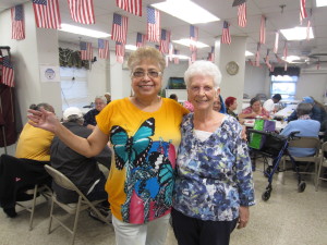 Saab Court Tenants Association President Wilfreda Venage and Vice President Marilynn Hallas at the annual Halloween party.