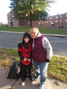 Nine-year-old Isiah Hernandez with Lynne Cimino, Talk/Read/Succeed! Outreach Coordinator who helped organize the Walking School Bus at Sullivan Apartments.