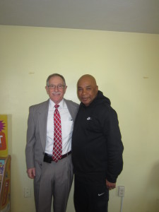 Springfield Housing Authority Executive Director William Abrashkin with Youth Engagement Coordinator Jimmie Mitchell, at Robinson Gardens Apartments.