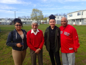 Robinson Gardens Apartments teens Sulie Hurtas, 13, and Chris Ortiz, 15, with Tuskegee Airmen Pilot Charles Cross and SHA Youth Engagement Coordinator Jimmie Mitchell.