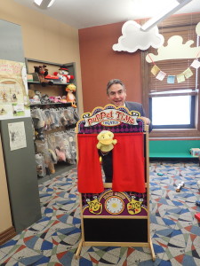 Mayor Domenic Sarno at the puppet station in the Indian Orchard library branch.