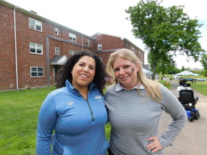 Chantal Roche, manager of diversity training at the United States Tennis Association's regional office in Weston, with SHA Deputy Executive Director Nicole Contois.