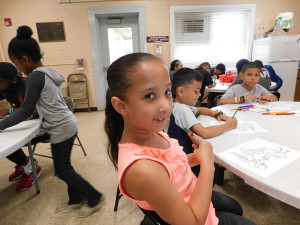 Joeliani Roche, 7, said the Sullivan Summer Camp is like going on vacation, every day.