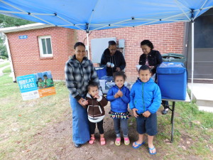 Duggan Park Apartments resident Merary Espada with her children, ArnieLiz, 2, Genesis, 4, and Jose, 5, outside the new T/R/S! office.
