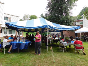 Duggan Park Apartments residents celebrate the new Talk/Read/Succeed! program at a back-to-school cookout.