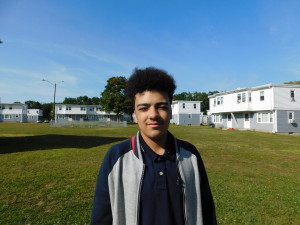 Robinson Gardens Youth Group member Christian Davis, 14, plans to start saving his money.